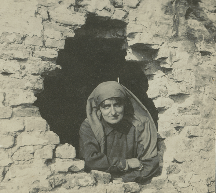 Mairi Chisholm, Elsie leaning through a hole in a damaged building in Pervyse,1915. © The National Library of Scotland 