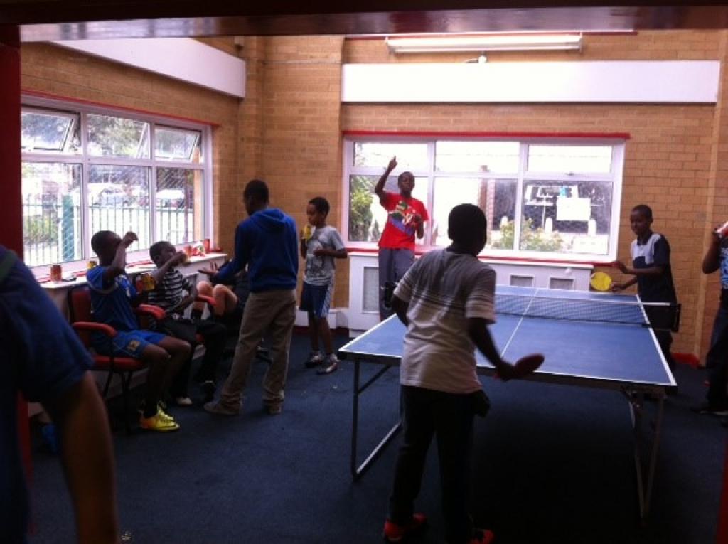 Billy Youth Project members playing table tennis
