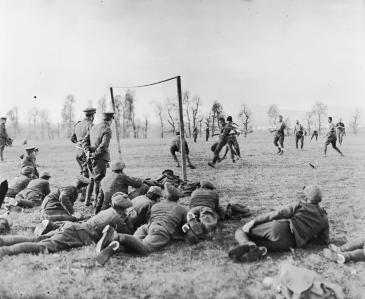 Image: Officers versus other ranks football match played by members of the 26th Divisional Ammunition Train, ASC near their camp, just outside the city of Salonika, Christmas Day 1915. © IWM (Q 31574)