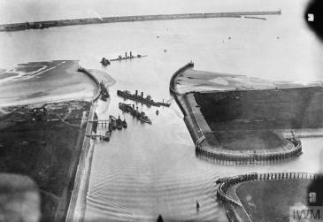 The British blockships HMS Thetis, HMS Intrepid and HMS Iphigenia in the mouth of the Bruge Canal at Zeebrugge. © IWM (Q 49164)